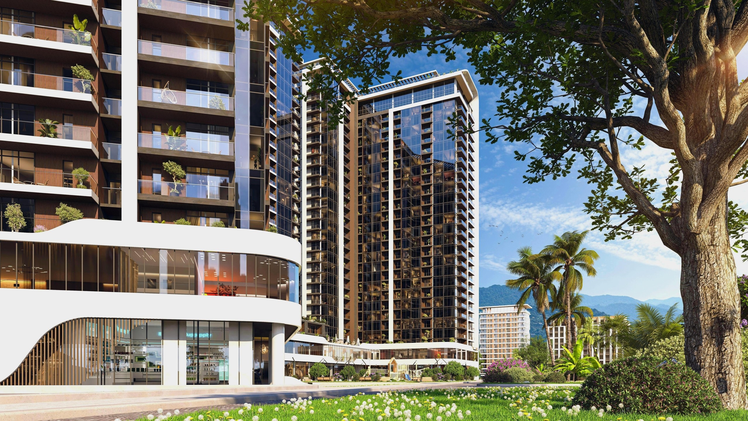 На изображении представлен реалистичный 3D-рендер экстерьера современного многоэтажного жилого комплекса с коммерческими помещениями на первом этаже и благоустроенной территорией.