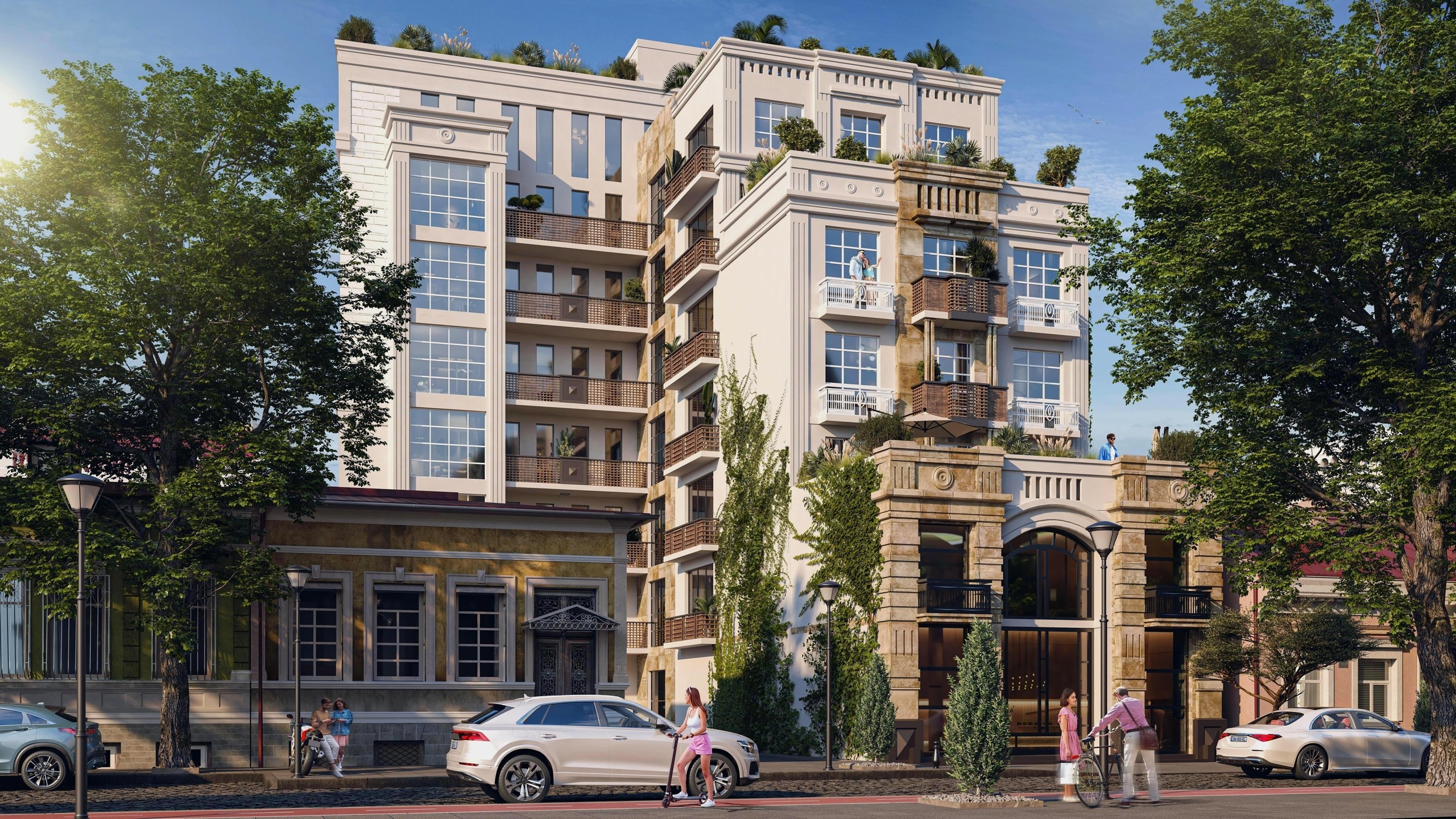 На изображении представлен реалистичный 3D-рендер фасада многоэтажного жилого здания в классическом стиле, вписанного в городскую среду с людьми и автомобилями.
