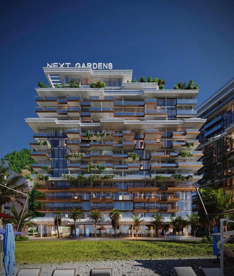 Реалистичный 3D-рендер фасада современного жилого комплекса 'Next Gardens' с озелененными террасами и зоной отдыха.