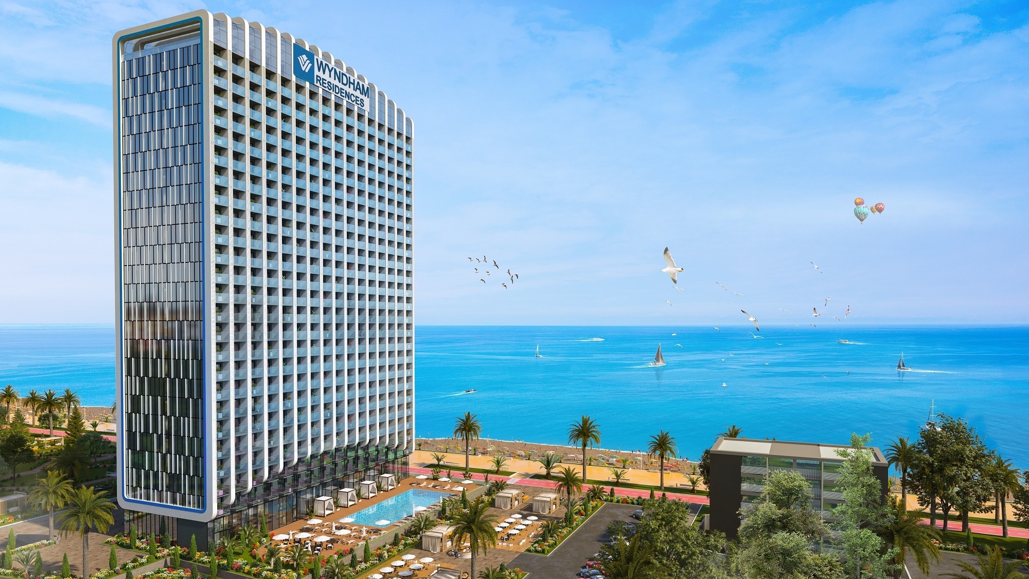 3D-визуализация многоэтажного гостиничного комплекса Wyndham Residences на побережье с бассейном и видом на море.